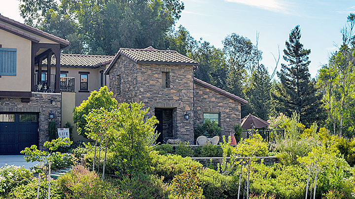 Bob and Gina Beeman's brick-lined, Mediterranean-style home.
